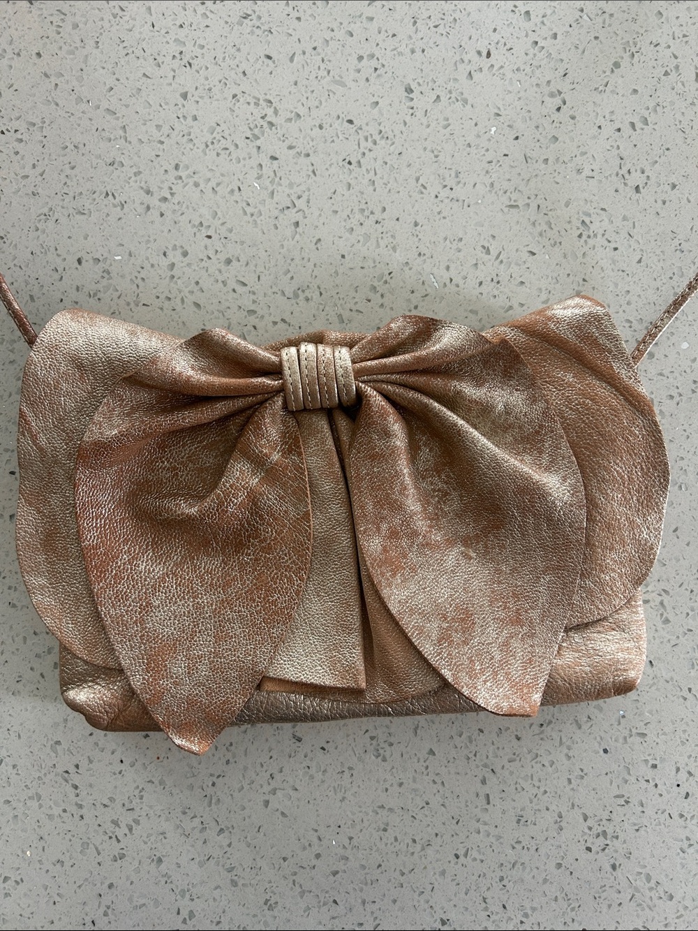 Susan Farber Collections Metallic Rose Bow Wristlet